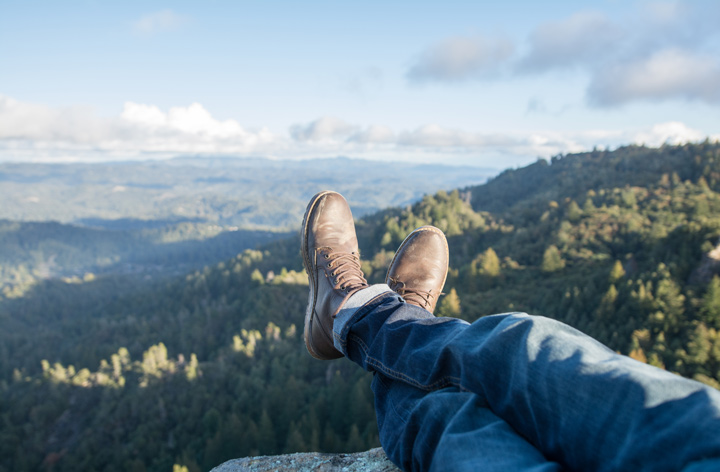 Hiker resting at vista - Hiking Tips, POST